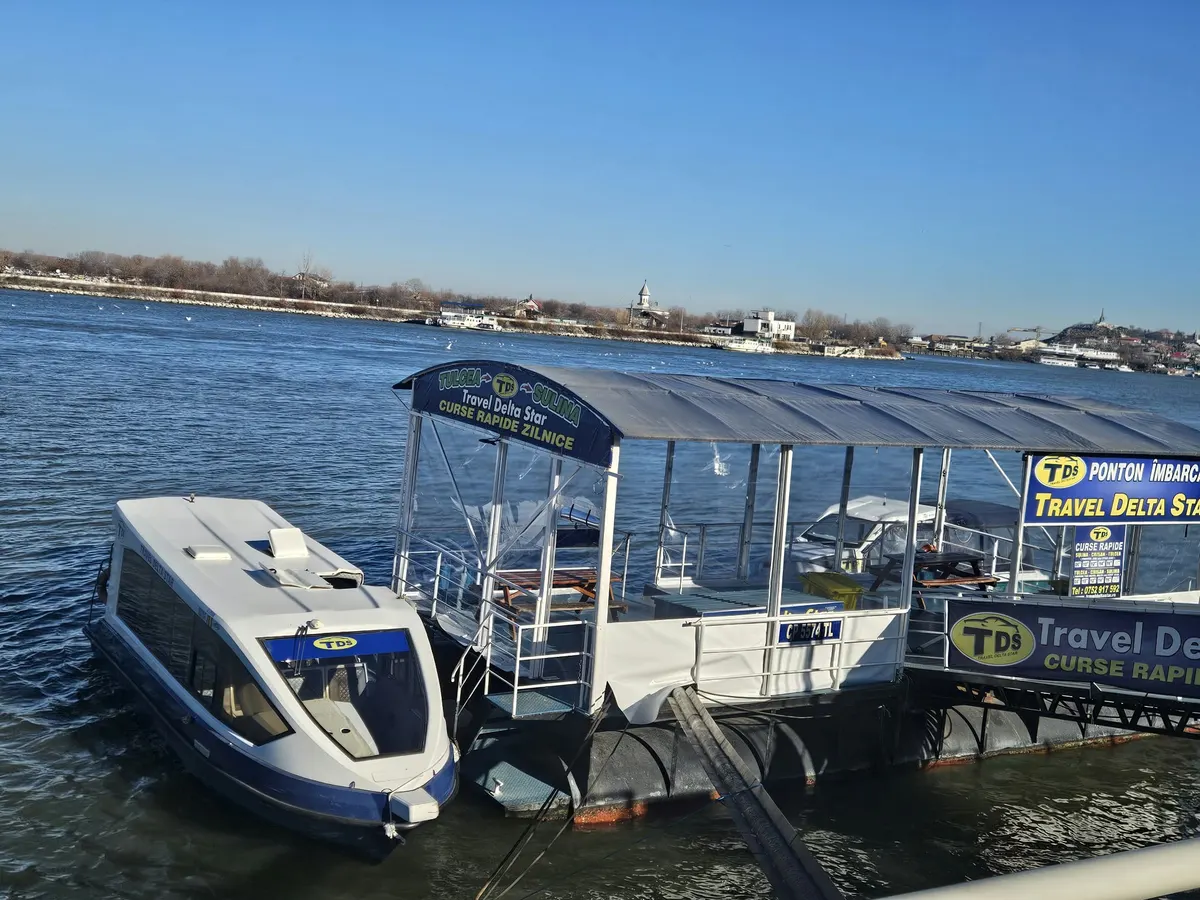 The Travel Delta Star boarding pontoon, with a boat moored